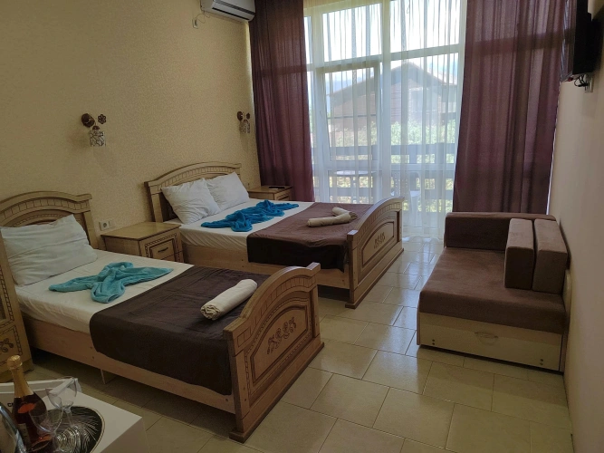 Standard Triple Family room with balcony