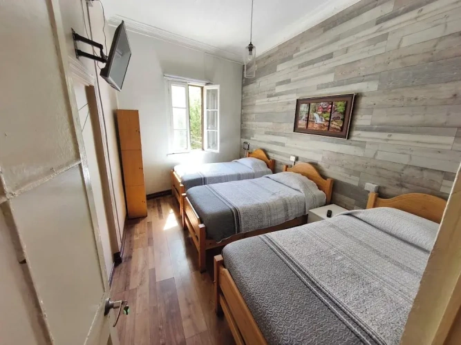 Standard Triple room with partial sea view
