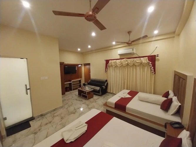 Standard Quadruple room with balcony and with partial sea view