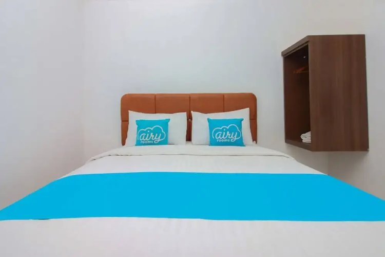 Airy Mapanget AA Maramis Manado