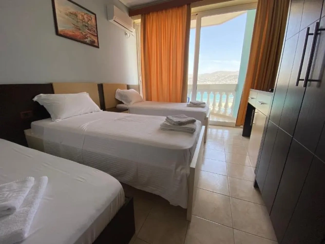 Standard Triple room with balcony and with sea view