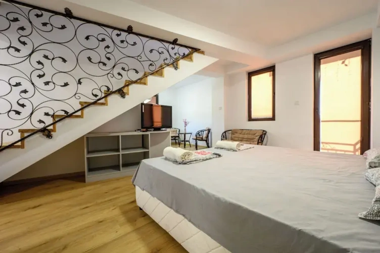 Luxury Quadruple room with balcony and with mountain view