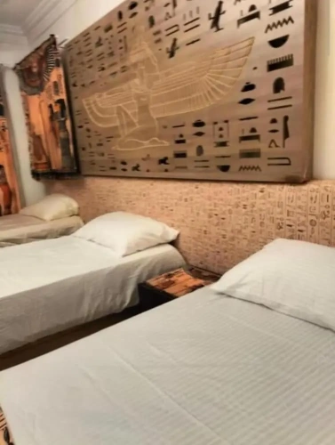 Deluxe Quadruple room with balcony and with city view