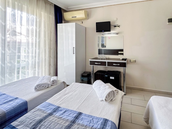 Standard Triple room with balcony