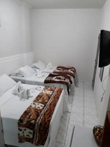 Standard Quadruple room with garden view