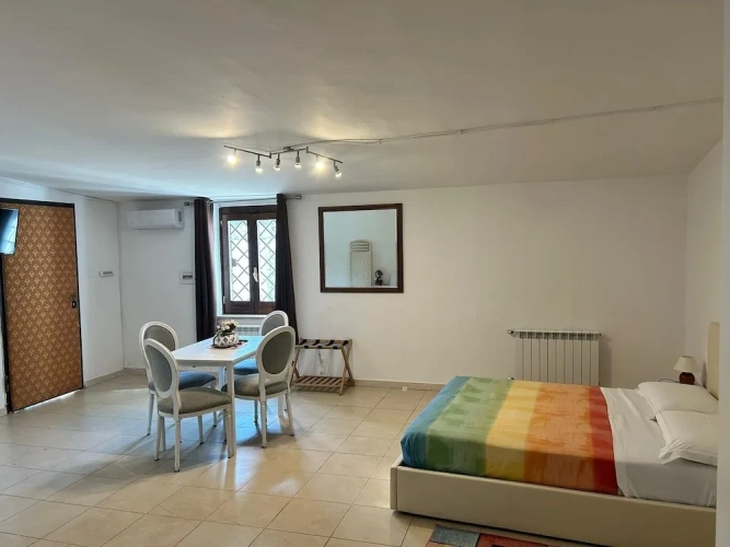 Standard Quadruple room with garden view