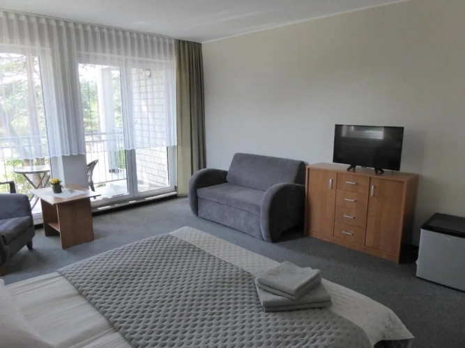 Standard Triple room with garden view