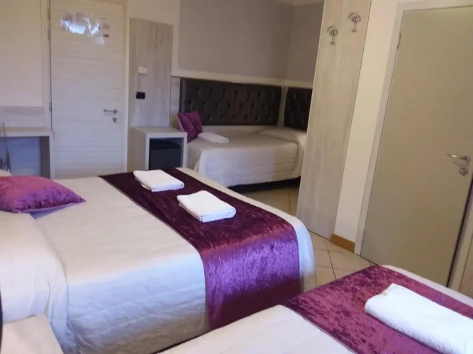 Standard Quadruple room with balcony and with sea view