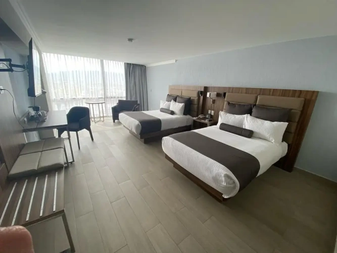 Executive Quadruple room with city view