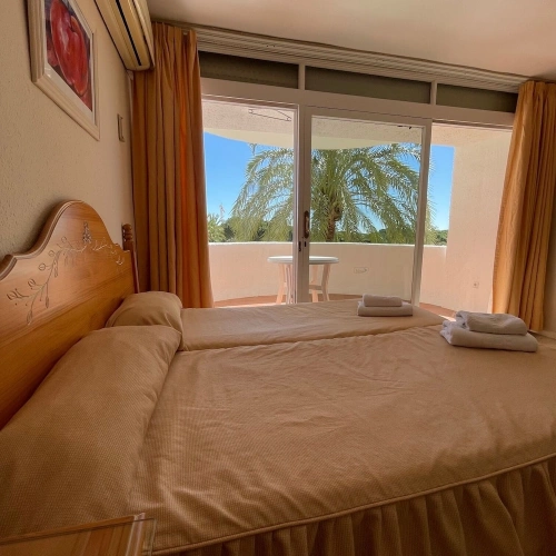 Twin Studio with balcony and with garden view