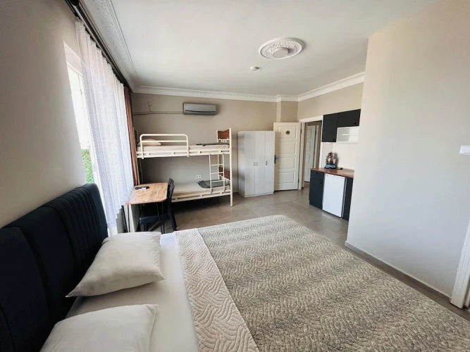 Classic Quadruple room with balcony and beachfront