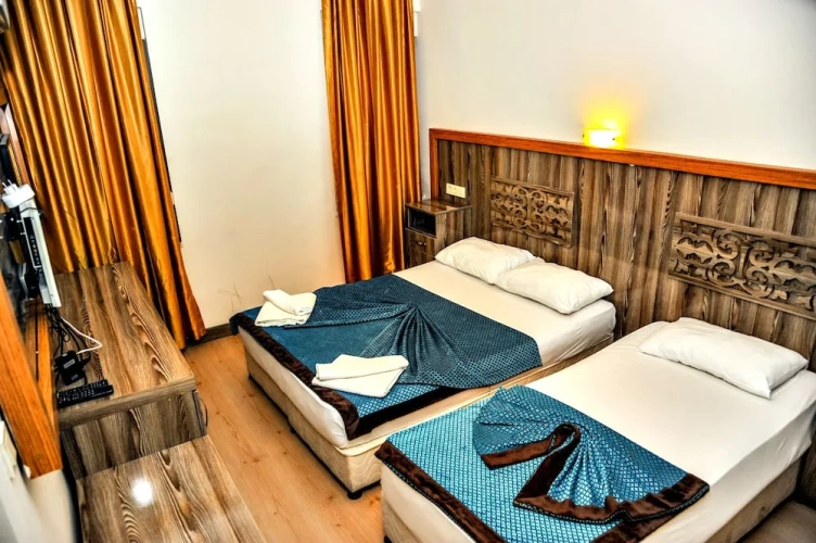 Standard Quadruple room with balcony and with sea view