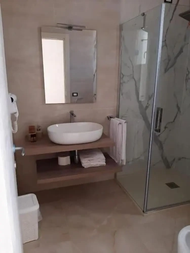 Standard Triple room with garden view