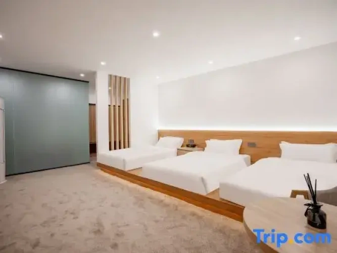 Deluxe Triple room with garden view