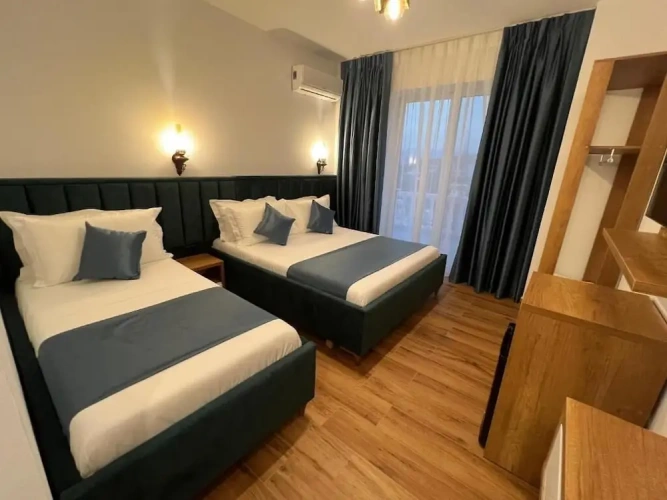 Deluxe Triple room with balcony and with sea view