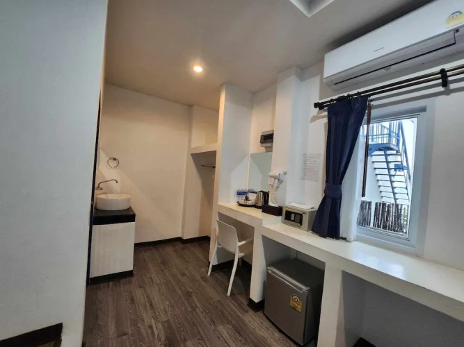 Standard Triple room with garden view