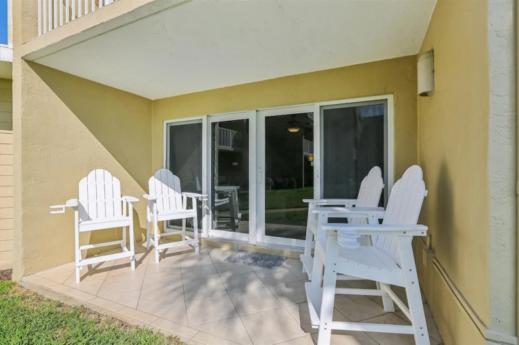 Beachfront Gem: Serene 2BD Haven With Pool & Views