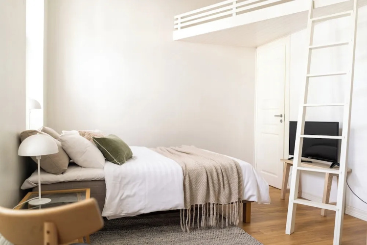 A bright wooden studio for four