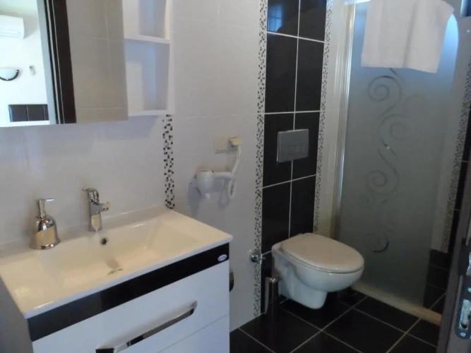 Standard Triple room with garden view