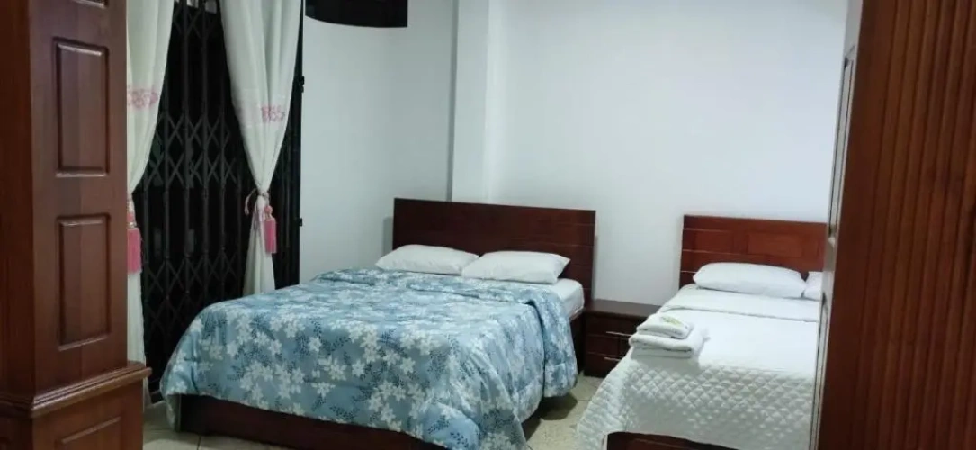 Standard Quadruple room with garden view