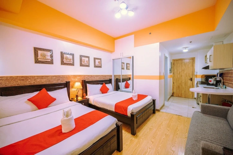 Deluxe Quadruple room with courtyard view