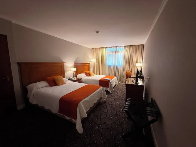 Standard Quadruple room with city view