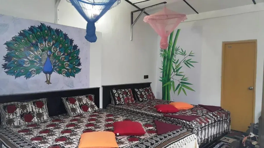 Standard Quadruple room with garden view