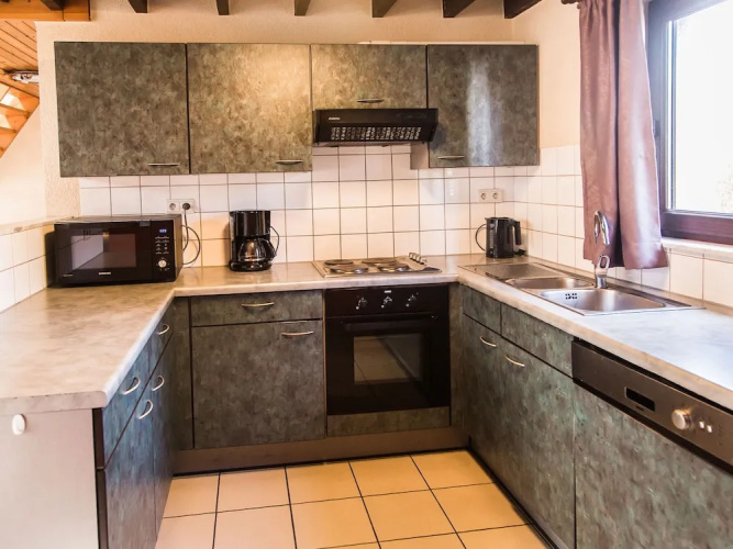 Comfortable bungalow with a terrace located in the Ourthedal