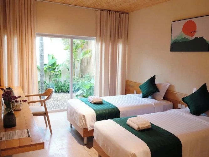 Deluxe Twin room with balcony and with garden view