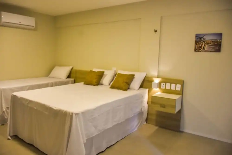 Standard Triple room with garden view