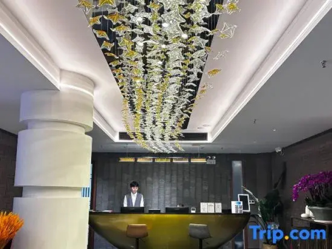 Sanxiang Zhenpin Hotel (Xiangtan Wanda Plaza)