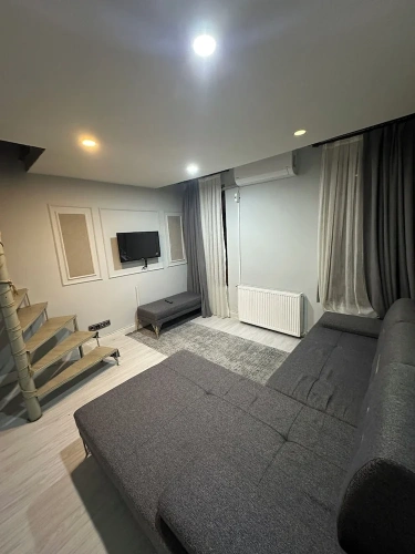Deluxe Quadruple room with balcony and with city view