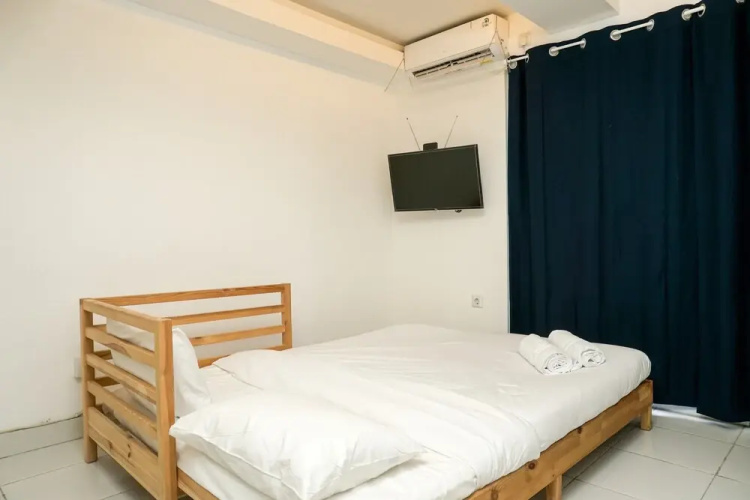 Simply White and Compact Studio at Amethyst Apartment