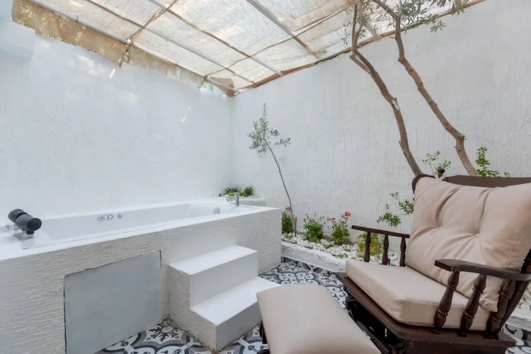 Comfort room with balcony and with garden view
