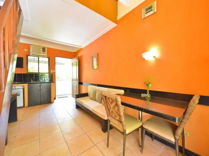 Standard Triple room with garden view