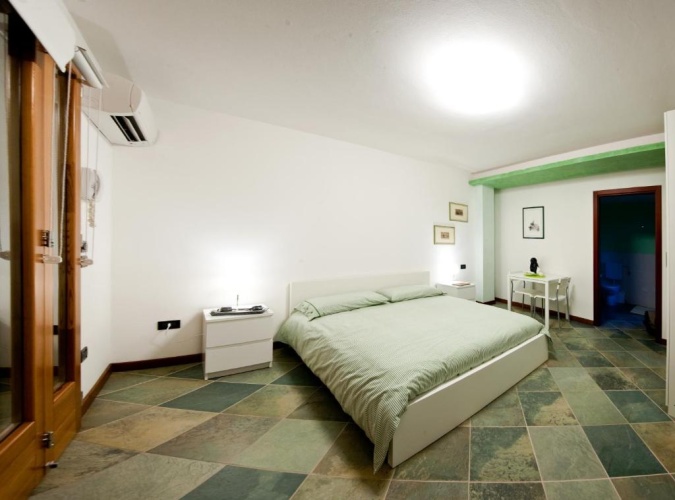 Standard Quadruple room with garden view