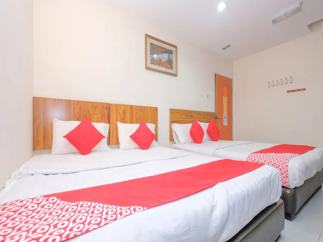OYO 89877 Sun Triang Hotel
