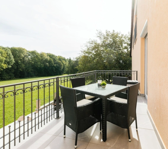Apartment with balcony and with garden view