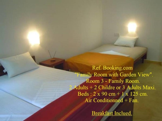 Standard Triple room with garden view