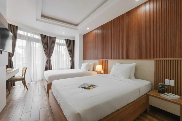 Executive Quadruple room with balcony and with city view