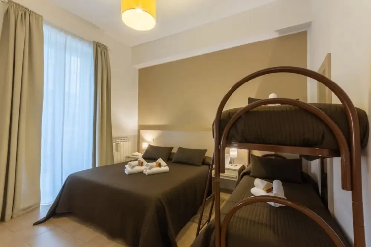 Deluxe Quadruple room with balcony