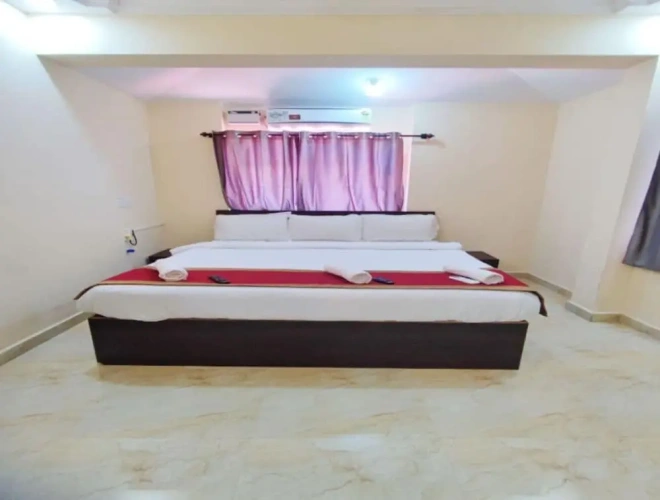 Deluxe Quadruple room with balcony