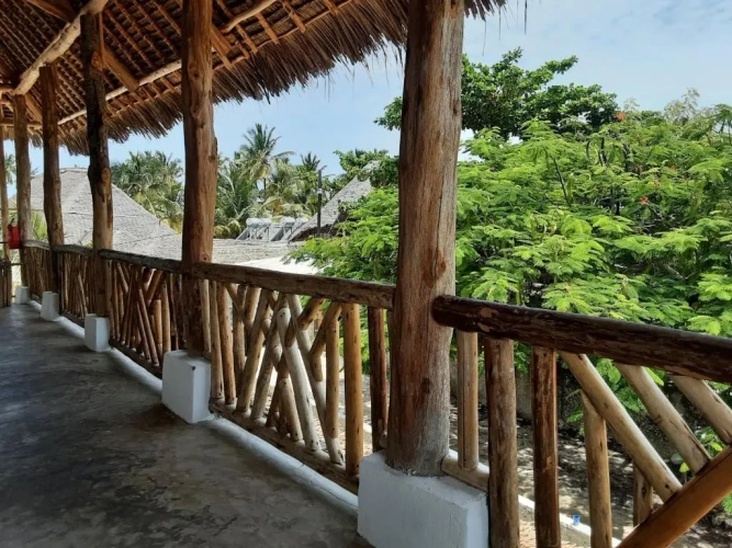 Standard Triple room with garden view