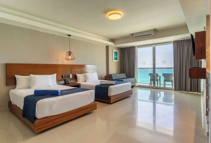 Deluxe Quadruple room with balcony and with ocean view