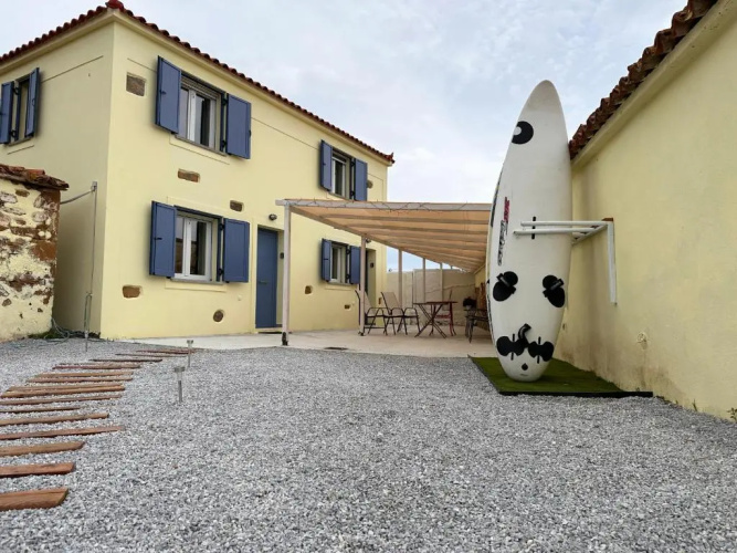 Surf-themed stone house at Kalliopi 2