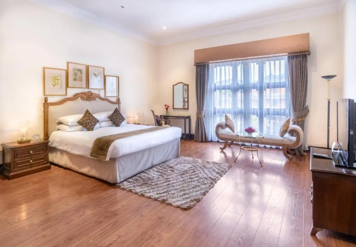 Quadruple Club Suite with garden view