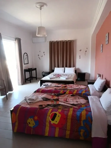 Comfort Quadruple room with balcony and with sea view