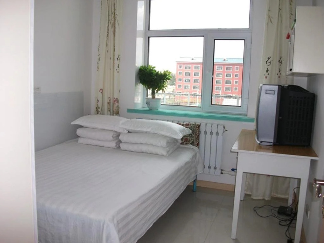 Mengxing Home Inn