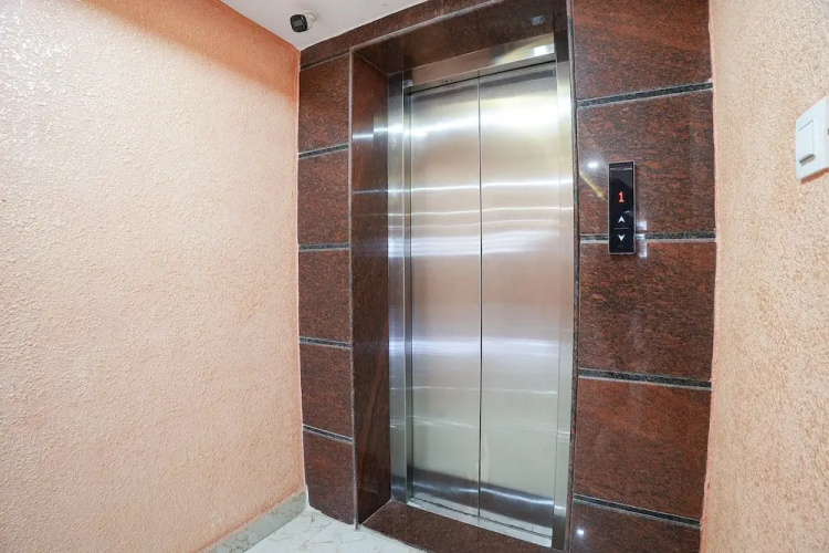 FabHotel A White Pearl Suites - Near Bangalore Airport
