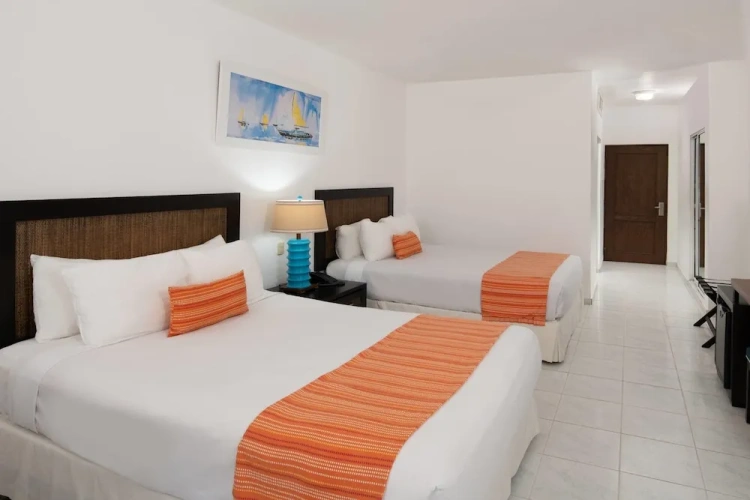 Standard Quadruple room with balcony and with garden view